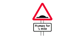 The words Humps For Half A Mile inside a white rectangle below a picture of a hump inside a red outlined triangle